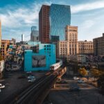 Denver downtown skyline with murals and light rail, a top sight for first-time visitors to Denver.