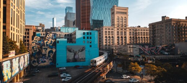 Denver downtown skyline with murals and light rail, a top sight for first-time visitors to Denver.